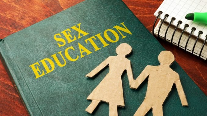 Book with title Sex education on a table.