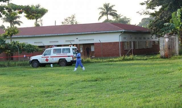 ambulance parked outside COVID-19 isolation center in Jinja