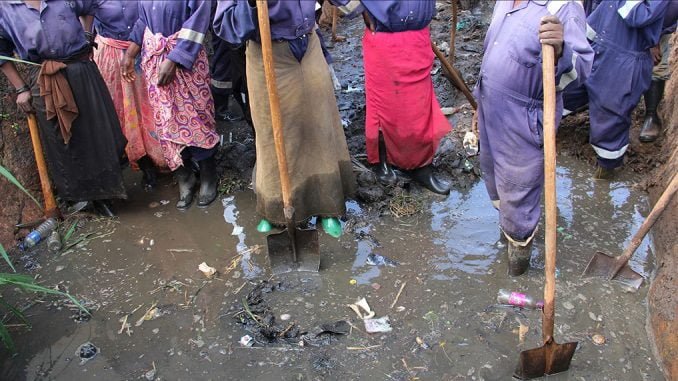 clogged-sewers-kcca-workers-waste-drainage-channels-garbage-collection