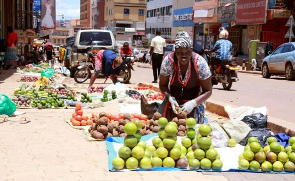 Fruit vendors along Nakasero market street in Kampala, Uganda