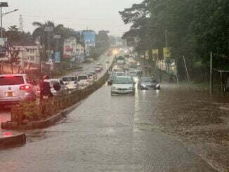 Torrential rains flood Kampala, cut off city roads